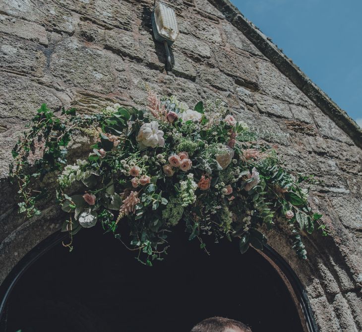 Floral Arch Outside Church