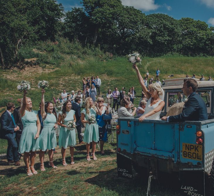 Bride & Groom In Vintage Land Rover