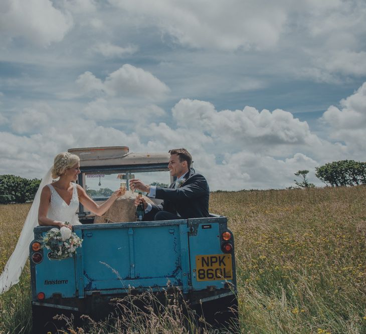 Bride & Groom In Vintage Land Rover