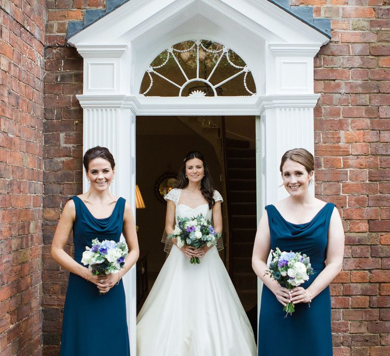 Bridal Party | Classic Bride in Caroline Castigliano Wedding Dress | Bridesmaids in Navy Dresses | Lucy Davenport Photography