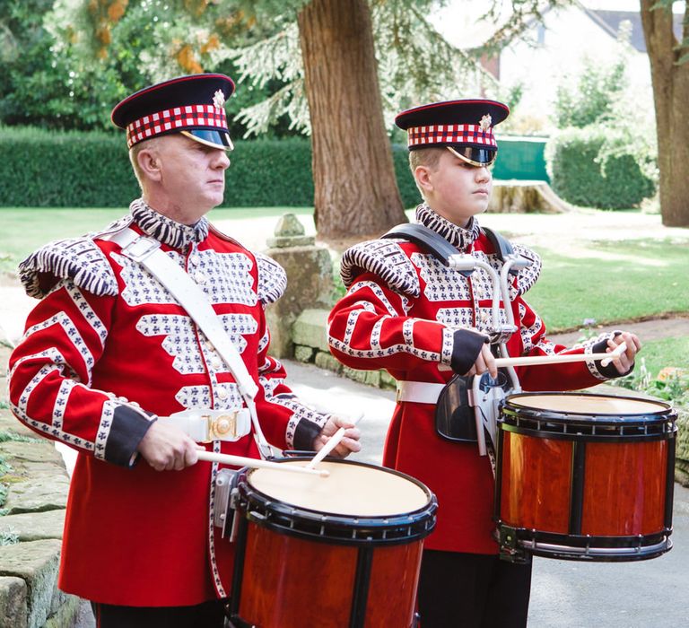 Scottish Bag Pipers in Tartan | Groom in Cad & the Dandy Tails | Lucy Davenport Photography