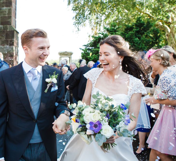 Confetti Moment | Classic Bride in Caroline Castigliano Wedding Dress | Groom in Cad & the Dandy Tails | Lucy Davenport Photography