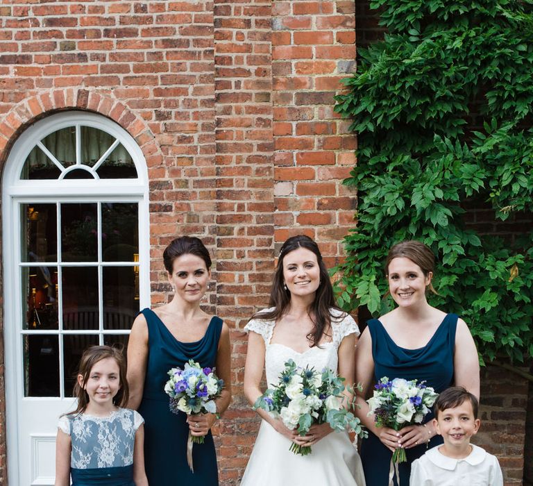 Classic Bride in Caroline Castigliano Wedding Dress | Bridesmaids in Navy Dresses | Lucy Davenport Photography