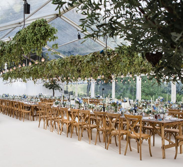 Botanical Marquee Reception with Hanging Greenery & Edison Light Installations | Lucy Davenport Photography