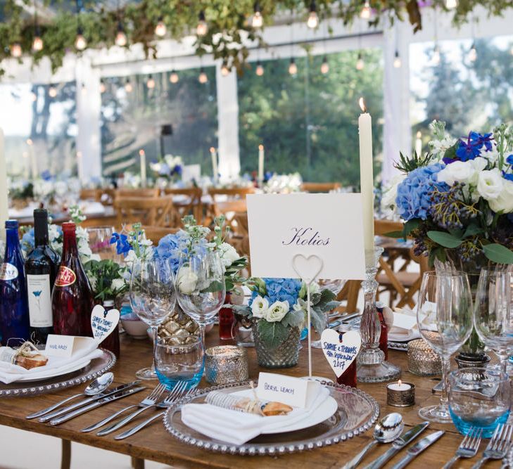 Botanical Marquee Reception with Hanging Greenery & Edison Light Installations | Lucy Davenport Photography