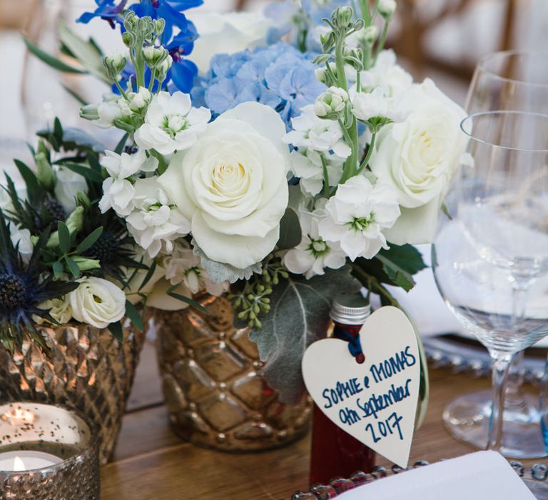 Botanical Marquee Reception with Hanging Greenery & Edison Light Installations | Lucy Davenport Photography