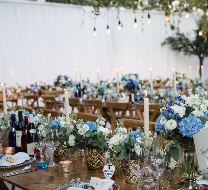 Botanical Marquee Reception with Hanging Greenery & Edison Light Installations | Lucy Davenport Photography