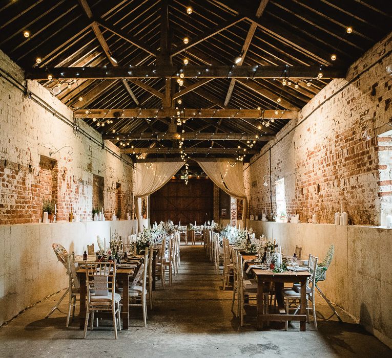 Fishley Hall Wedding With Rustic Details Lots Of Foliage & Festoon Lights With Krispy Kreme Donut Wedding Cake & Images By Luis Holden Photography