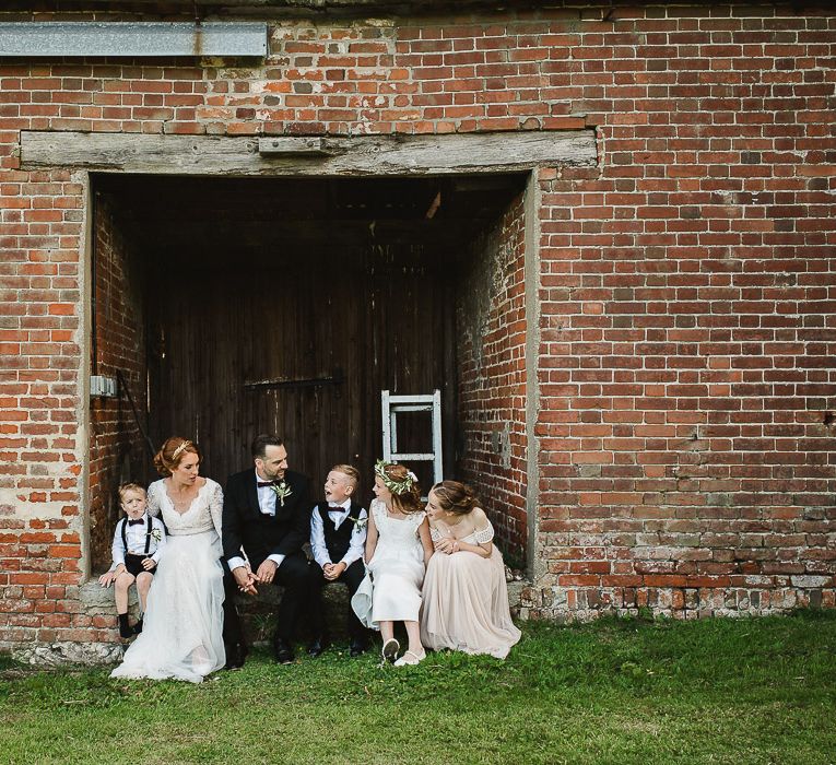 Fishley Hall Wedding With Rustic Details Lots Of Foliage & Festoon Lights With Krispy Kreme Donut Wedding Cake & Images By Luis Holden Photography