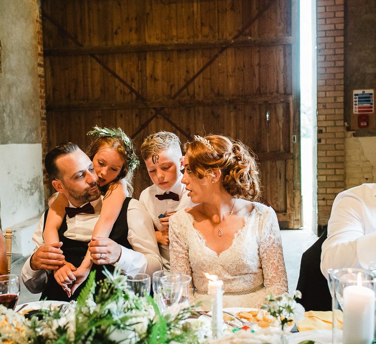 Fishley Hall Wedding With Rustic Details Lots Of Foliage & Festoon Lights With Krispy Kreme Donut Wedding Cake & Images By Luis Holden Photography