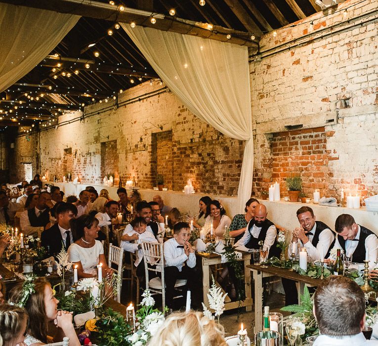 Fishley Hall Wedding With Rustic Details Lots Of Foliage & Festoon Lights With Krispy Kreme Donut Wedding Cake & Images By Luis Holden Photography