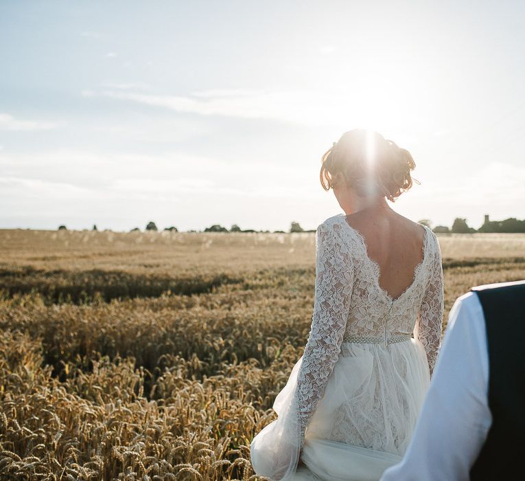 Fishley Hall Wedding With Rustic Details Lots Of Foliage & Festoon Lights With Krispy Kreme Donut Wedding Cake & Images By Luis Holden Photography