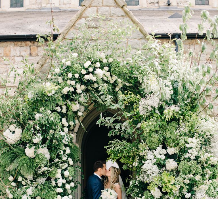 Elegant Flower Arch | Summer Styling Reimagined | Florals by <a href="https://www.allforlovelondon.com/pages/wedding-flowers" rel="noopener" target="_blank”>All For Love</a> | Image by <a href="https://www.mandjphotos.com/#photo-5818" rel="noopener" target="_blank”>M&J Photography</a>