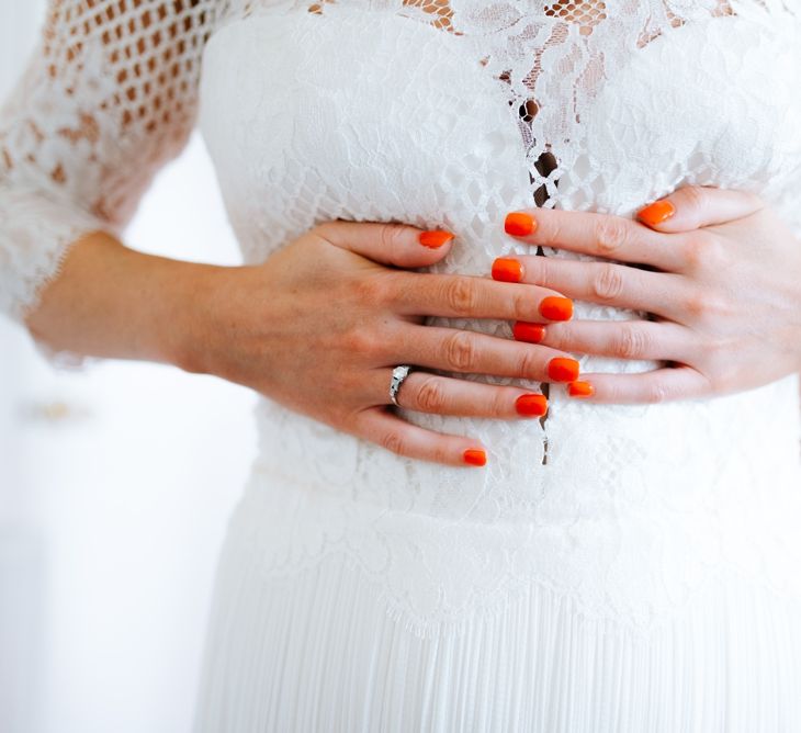 Bride With Orange Red Nails