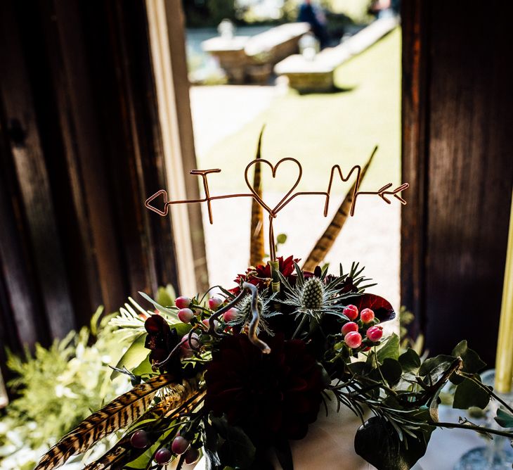 Rustic Wedding Cake with Feathers & Foliage