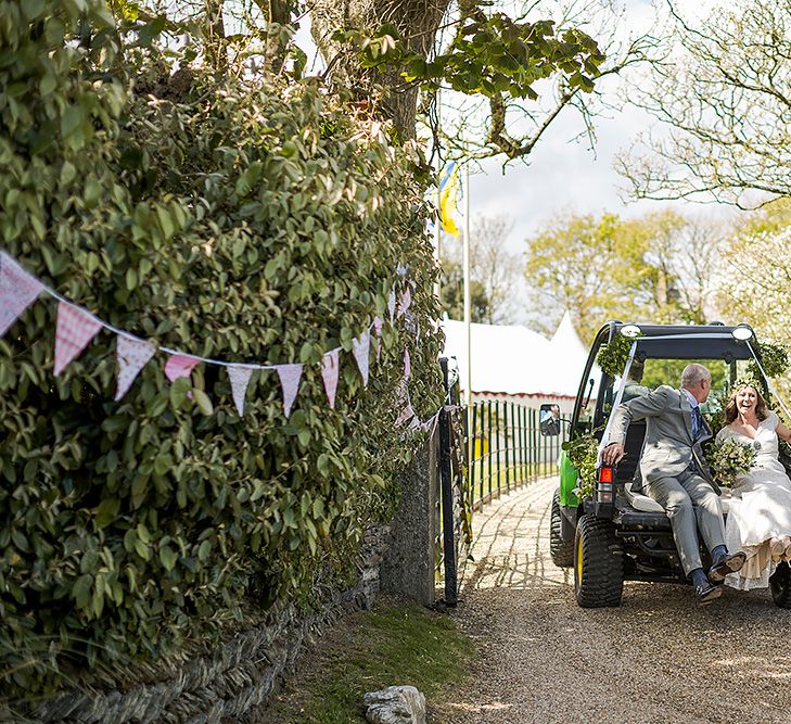 Bride & Groom In Tractor For Wedding Day