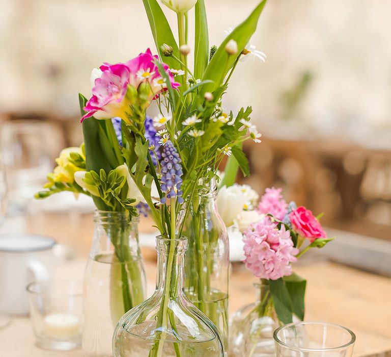 Spring Flowers In Bud Vases For Wedding