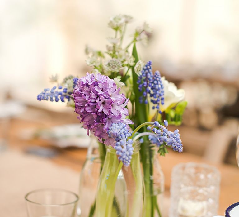 Spring Flowers In Bud Vases For Wedding