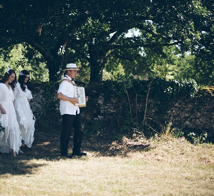 French Chateau Wedding At Château de la Bourlie With Bride In Vintage Gown & Bridesmaids In White Dresses By Silken Studio With Images From Lelia Scarfiotti