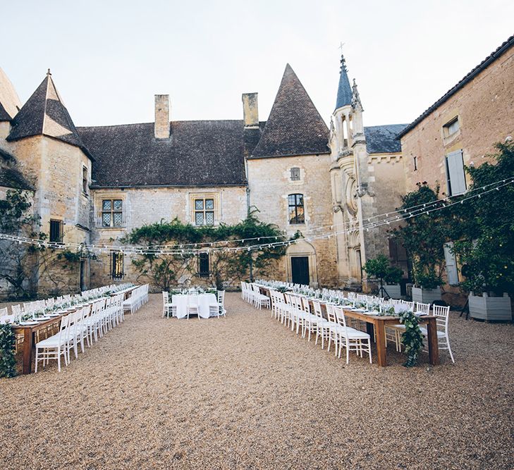 French Chateau Wedding At Château de la Bourlie With Bride In Vintage Gown & Bridesmaids In White Dresses By Silken Studio With Images From Lelia Scarfiotti