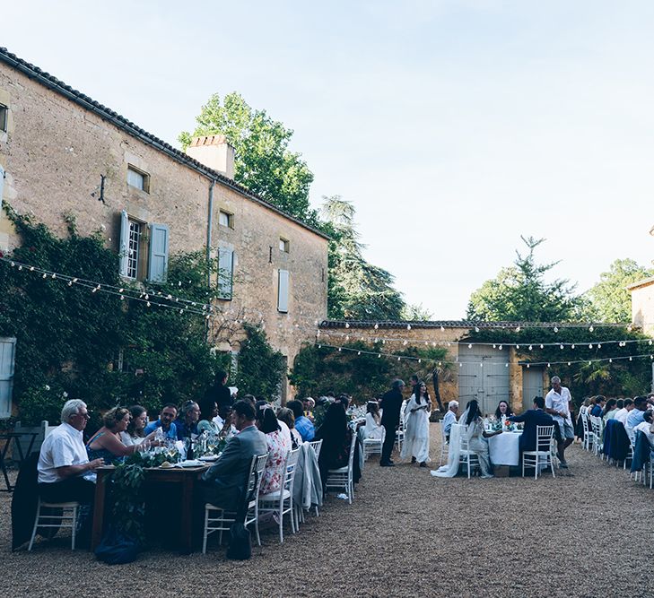 French Chateau Wedding At Château de la Bourlie With Bride In Vintage Gown & Bridesmaids In White Dresses By Silken Studio With Images From Lelia Scarfiotti