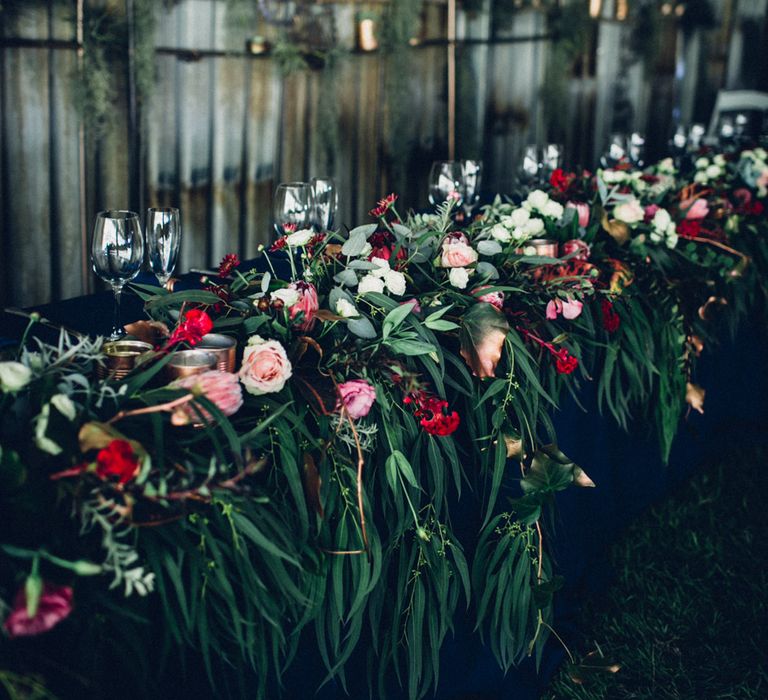 Navy, Red & Copper Wedding Decor | Steampunk Barn Wedding | | Andy & Szerdi Photography | Forman Wedding Films