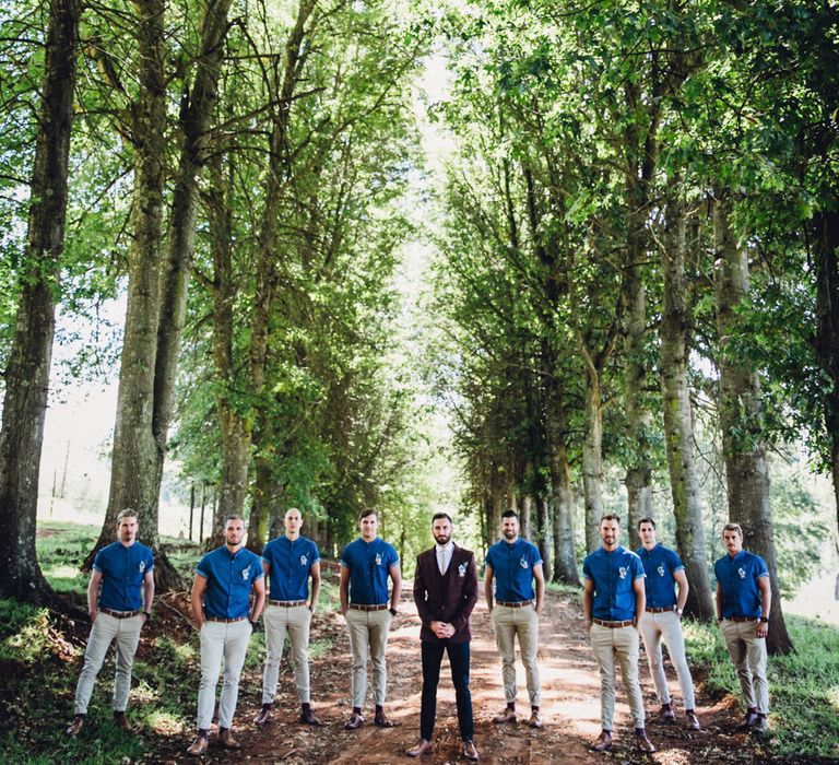 Groom in Burgundy Terrence Bray Suit | Groomsmen in Denim Shirts & Chinos | Andy & Szerdi Photography | Forman Wedding Films