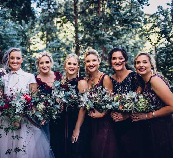 Bride in Purple Terrence Bray Wedding Dress | Bridesmaids in Navy Dresses | Andy & Szerdi Photography | Forman Wedding Films