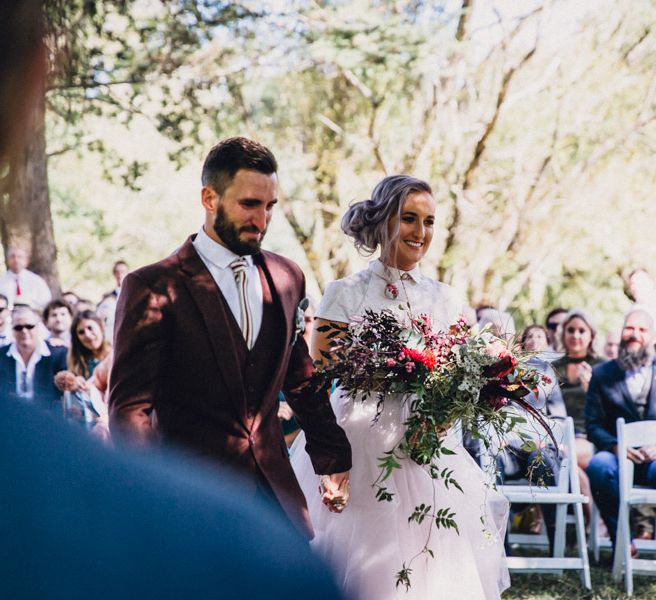 Outdoor Alternative Wedding at Nonnins Family Farm | Bride in Purple Terrence Bray Wedding Dress | Groom in Burgundy Suit | Andy & Szerdi Photography | Forman Wedding Films