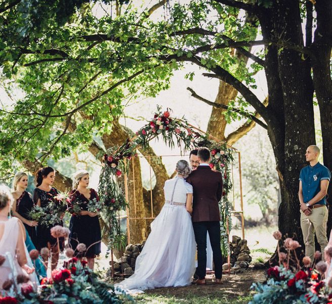 Outdoor Alternative Wedding at Nonnins Family Farm | Bride in Purple Terrence Bray Wedding Dress | Groom in Burgundy Suit | Andy & Szerdi Photography | Forman Wedding Films