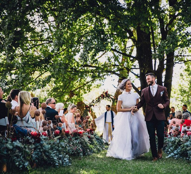 Outdoor Alternative Wedding at Nonnins Family Farm | Bride in Purple Terrence Bray Wedding Dress | Groom in Burgundy Suit | Andy & Szerdi Photography | Forman Wedding Films