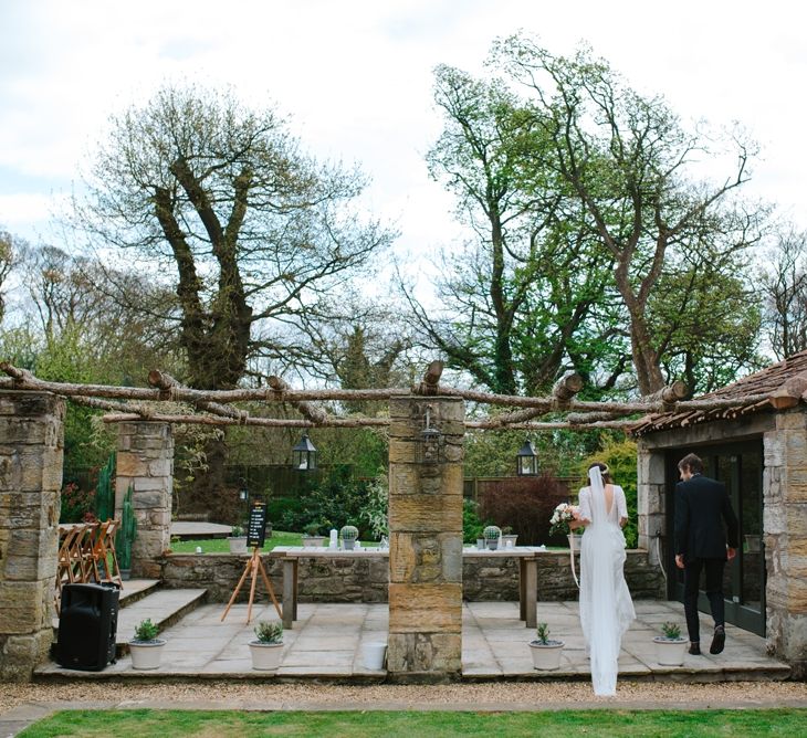 Windmill Barn Wedding With Bride In Bespoke Dress With Delicate Flower Crown & Images And Film From Tub Of Jelly Alternative Wedding Photography