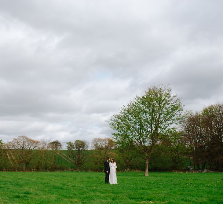 Windmill Barn Wedding With Bride In Bespoke Dress With Delicate Flower Crown & Images And Film From Tub Of Jelly Alternative Wedding Photography