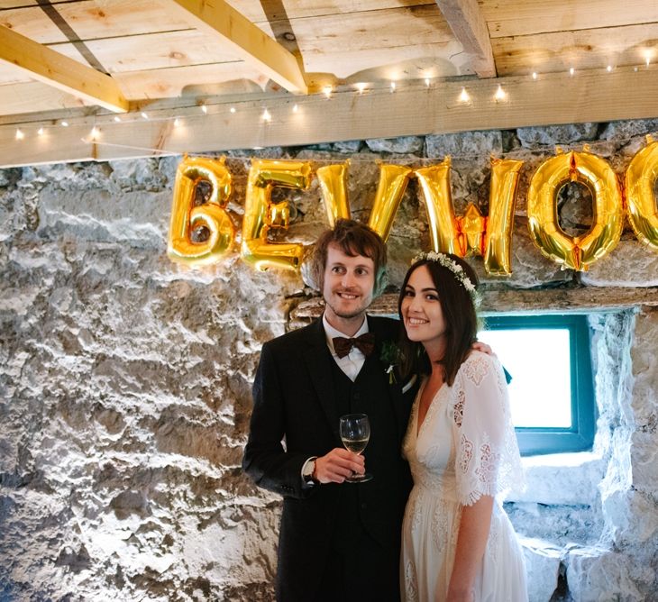 Windmill Barn Wedding With Bride In Bespoke Dress With Delicate Flower Crown & Images And Film From Tub Of Jelly Alternative Wedding Photography