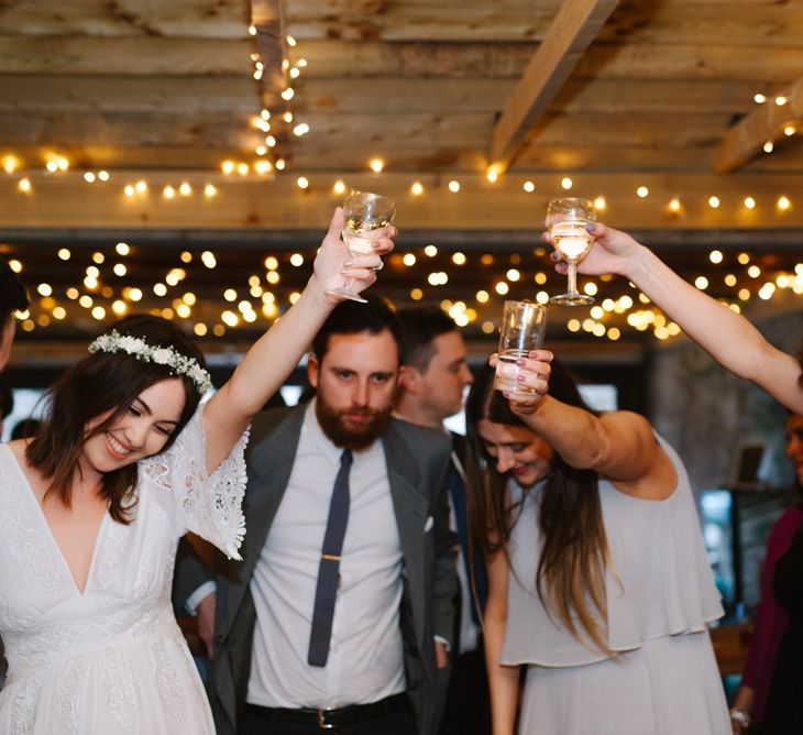 Windmill Barn Wedding With Bride In Bespoke Dress With Delicate Flower Crown & Images And Film From Tub Of Jelly Alternative Wedding Photography