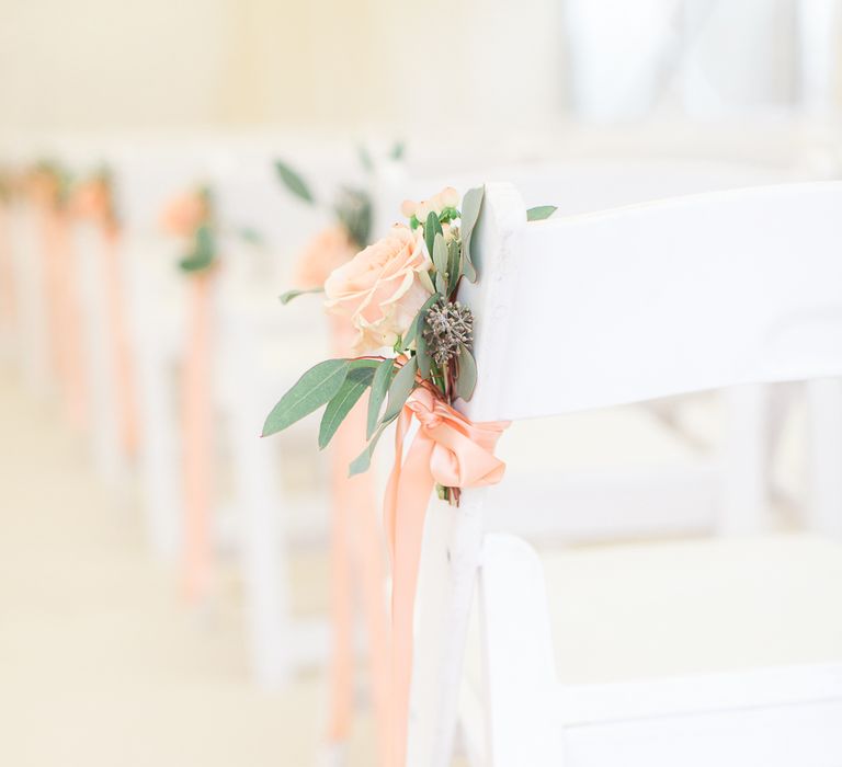 Peach & Eucalyptus Aisle Chair Back Decor | Sung Blue Photography | ROOST Film Co.