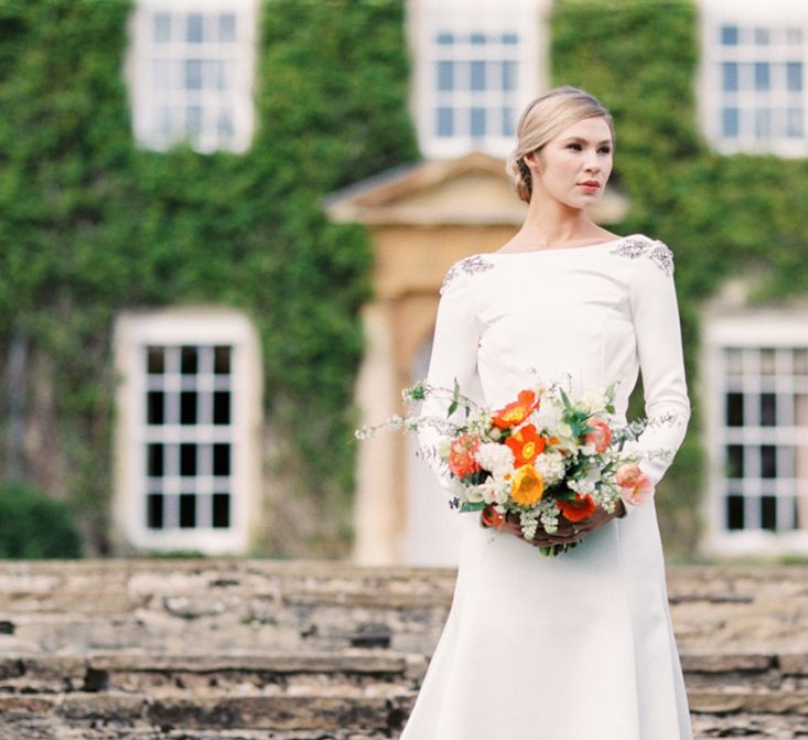 Wedding Dress | Elegant Wedding Inspiration at Cornwell Manor with Floral Design by Bramble and Wild | Bowtie & Belle Photography | Carmencita Film Lab | Baxter and Ted Films