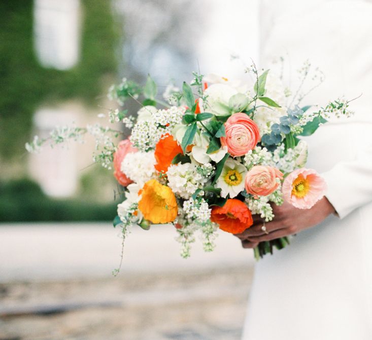 Coral Wedding Bouquet | Elegant Wedding Inspiration at Cornwell Manor with Floral Design by Bramble and Wild | Bowtie & Belle Photography | Carmencita Film Lab | Baxter and Ted Films