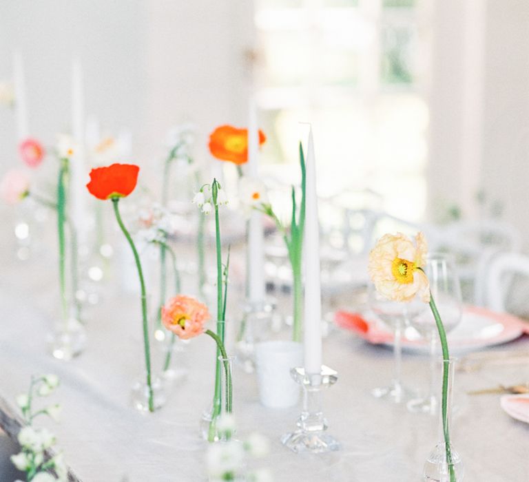 Flower Stems in Jars | Elegant Wedding Inspiration at Cornwell Manor with Floral Design by Bramble and Wild | Bowtie & Belle Photography | Carmencita Film Lab | Baxter and Ted Films