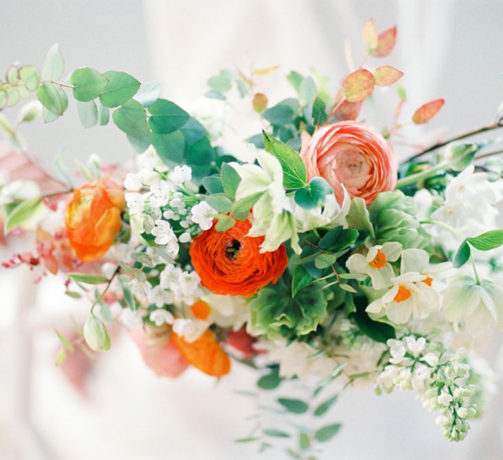 Orange Chair Back Decor | Elegant Wedding Inspiration at Cornwell Manor with Floral Design by Bramble and Wild | Bowtie & Belle Photography | Carmencita Film Lab | Baxter and Ted Films