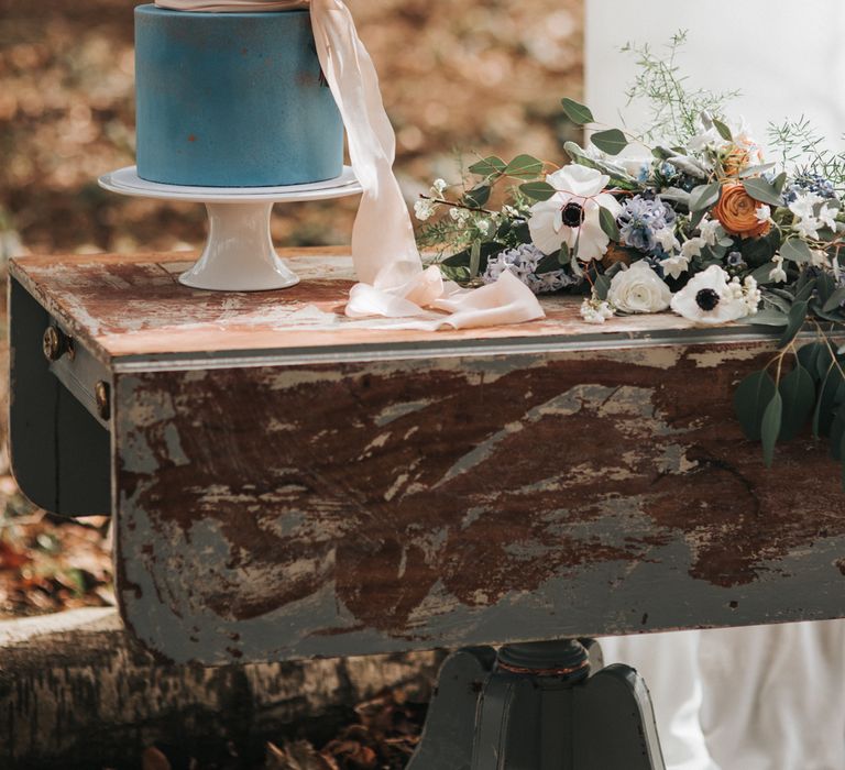 Blue Wedding Cake With Pink Ribbon