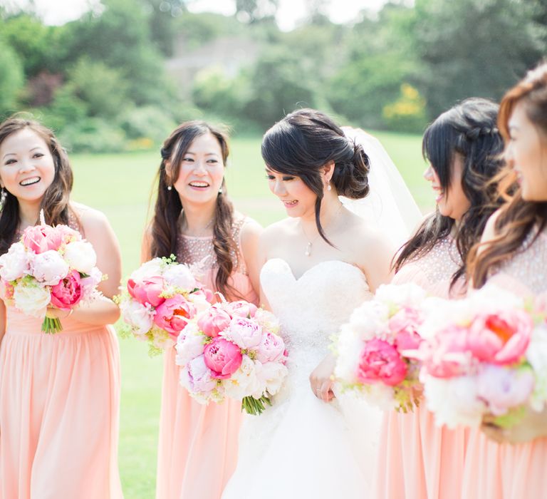 Bridesmaids In Floor Length Pink Gowns