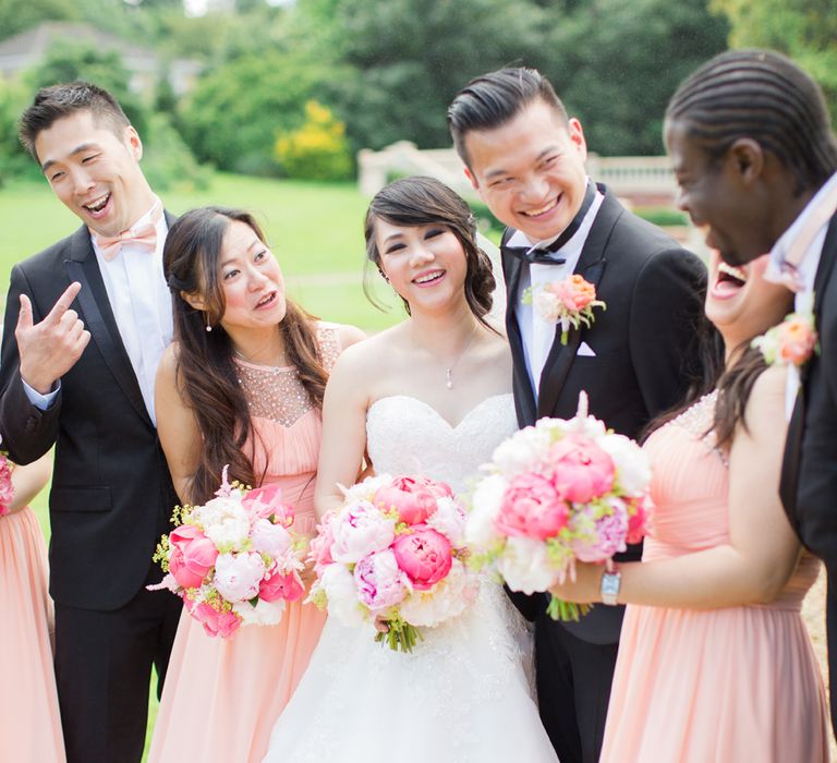 Bridesmaids In Floor Length Pink Gowns