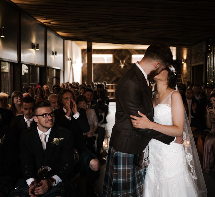 The Ceremony | The Kiss | Owen House Wedding Barn | Joyce Young London | Damian Brandon