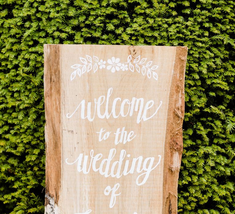 Wooden Wedding Welcome Sign | Outdoor Ceremony & Rustic Barn Reception at Pennard House Somerset | John Barwood Photography