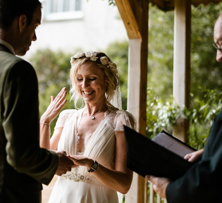 Wedding Ceremony | Bride in Jenny Packham Gown | Groom in Hugo Morris Tweed Suit | Outdoor Ceremony & Rustic Barn Reception at Pennard House Somerset | John Barwood Photography