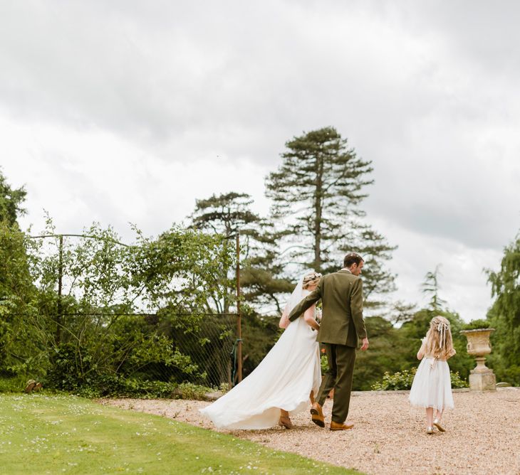 Bride in Jenny Packham Gown | Groom in Hugo Morris Tweed Suit | Outdoor Ceremony & Rustic Barn Reception at Pennard House Somerset | John Barwood Photography