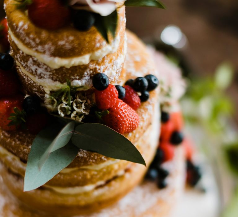 Naked Sponge Cake with Fruit Decor | Outdoor Ceremony & Rustic Barn Reception at Pennard House Somerset | John Barwood Photography