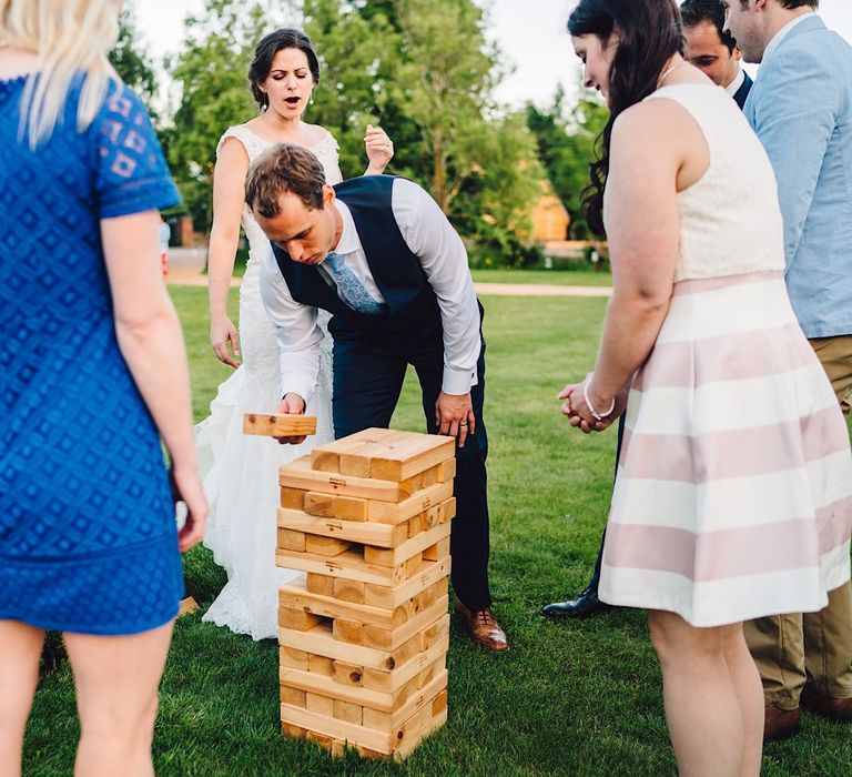 Giant Jenga | Bride in Morlee | Groom in Hugo Boss Suit | DIY At Home Marquee Wedding | J S Coates Wedding Photography