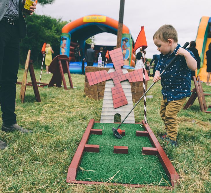 Garden Games For A Garden Wedding With Stretch Tent With Bride In Karen Willis Holmes Sequinned Gown & Images and Film From Wagtail Productions